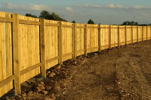 Wood fence with a fresh coat of stain